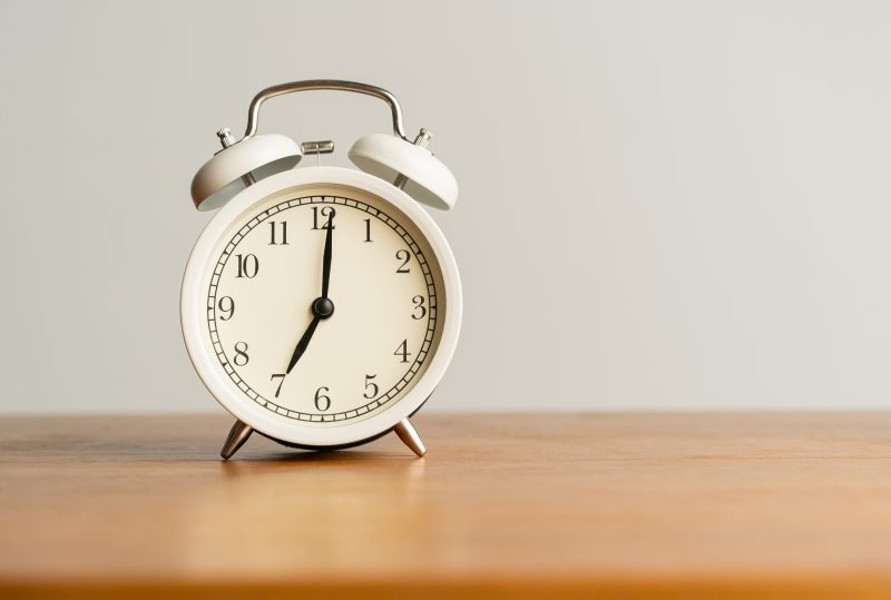 Alarm clock representing daily cycles