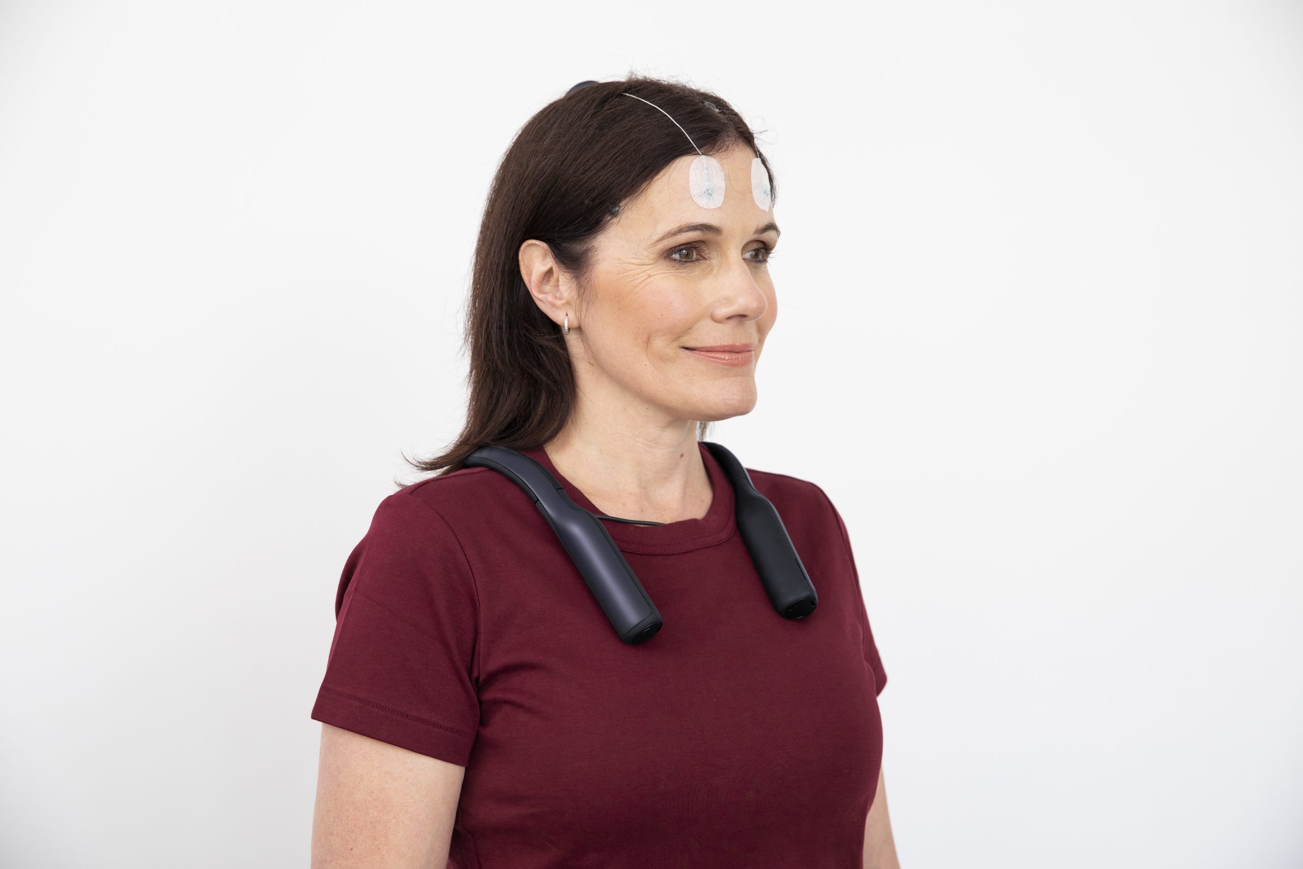 Woman wearing the Seer Sense device